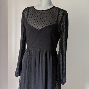 Beautiful black midi dress with sheer detail: perfect Christmas dress